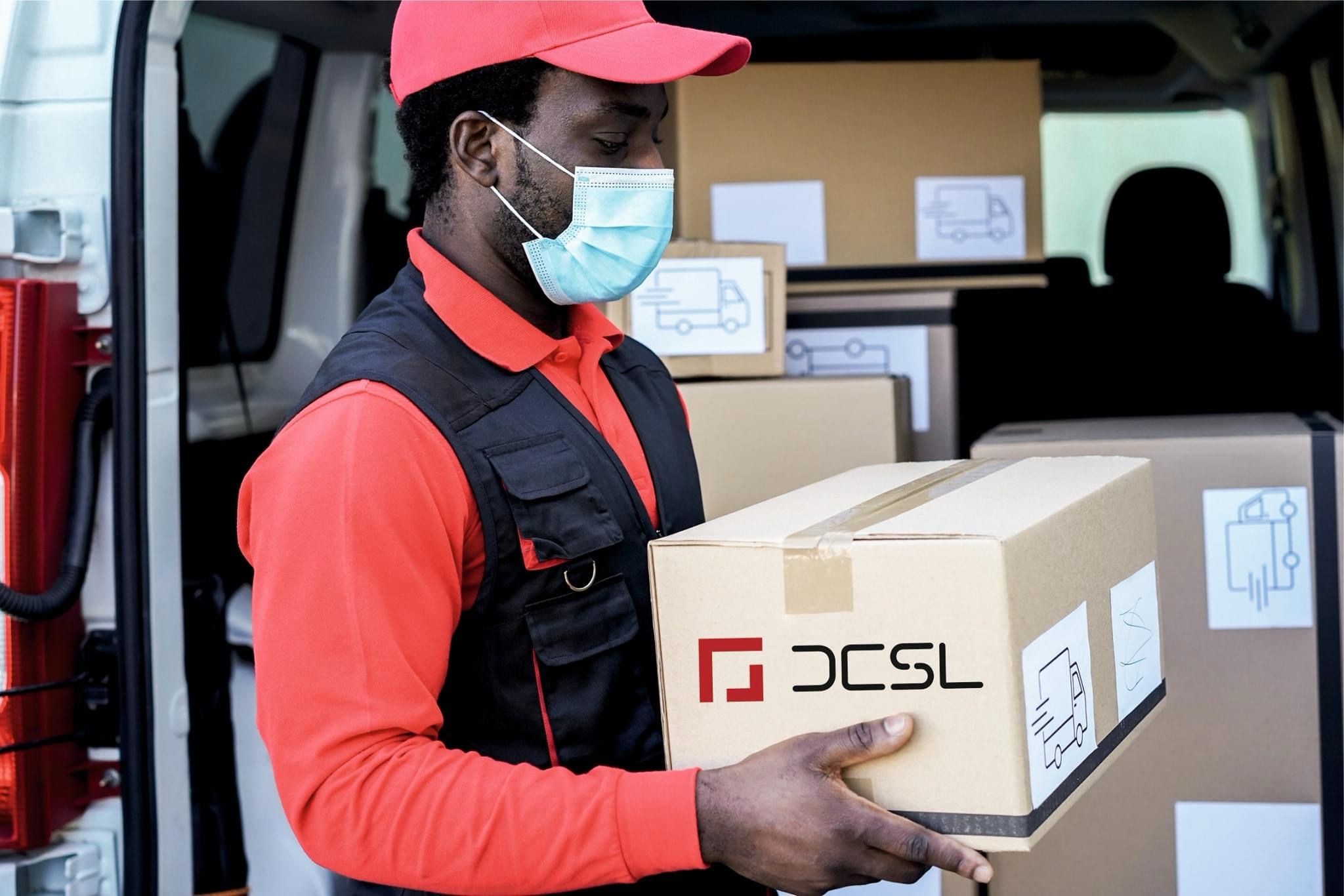 Delivery driver holding a package